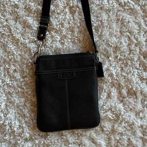 Coach leather crossbody, perfect for travel
